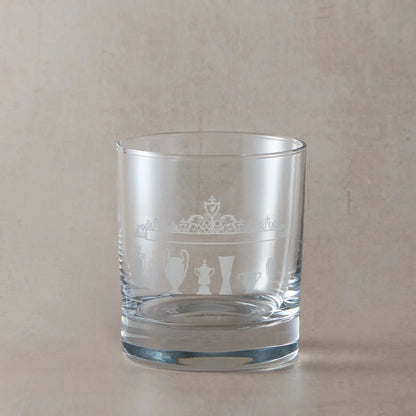 Engraved whisky glass featuring football trophy silhouettes and Shankly Gates outside of Liverpool's Anfield stadium