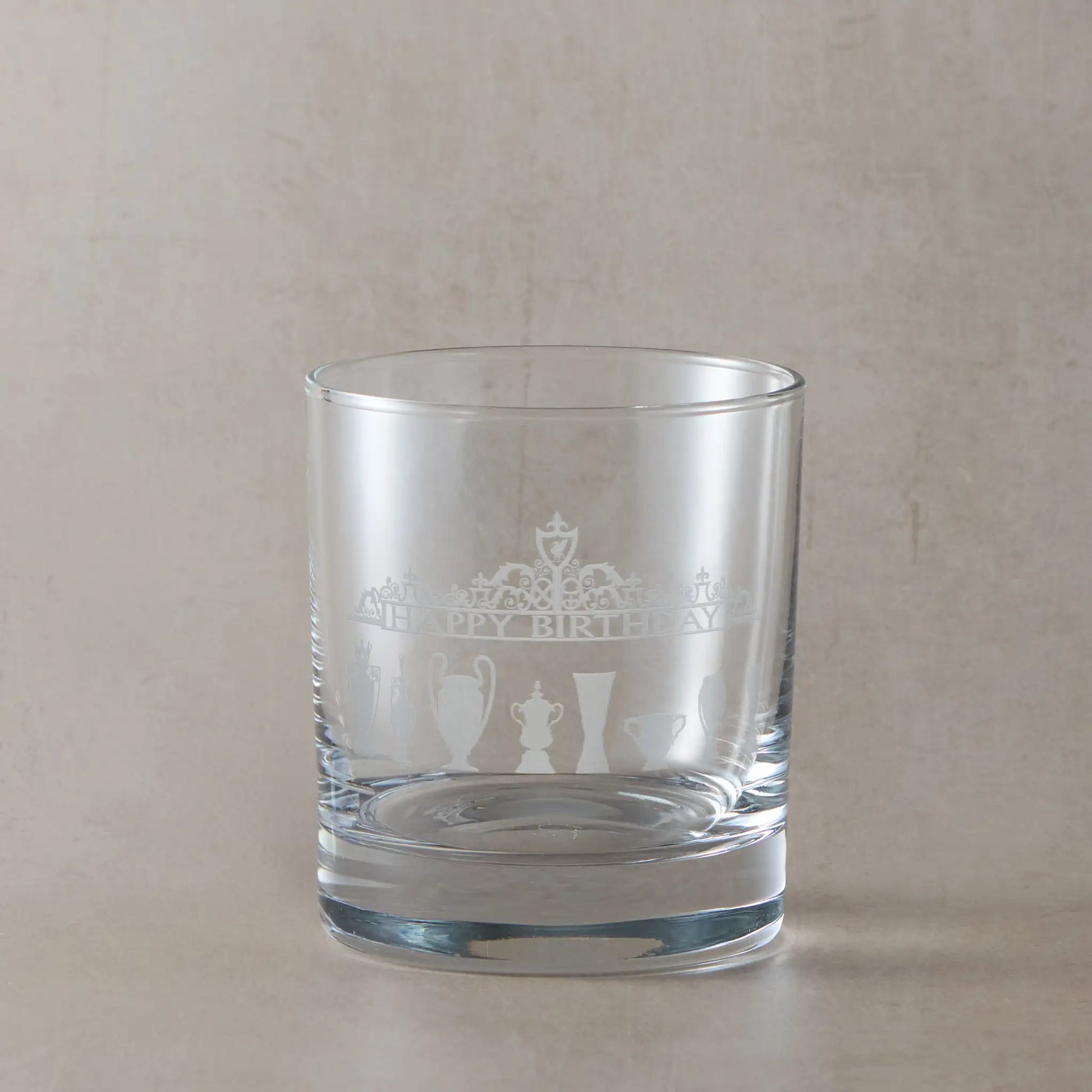 Whisky glass engraved with football trophy silhouettes and Shankly Gates overthrow