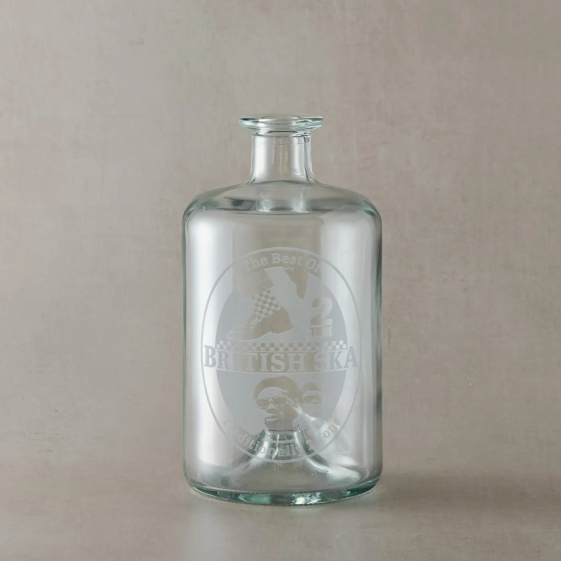 Engraved glass apothecary decanter featuring a SKA and Two Tone inspired oval design.