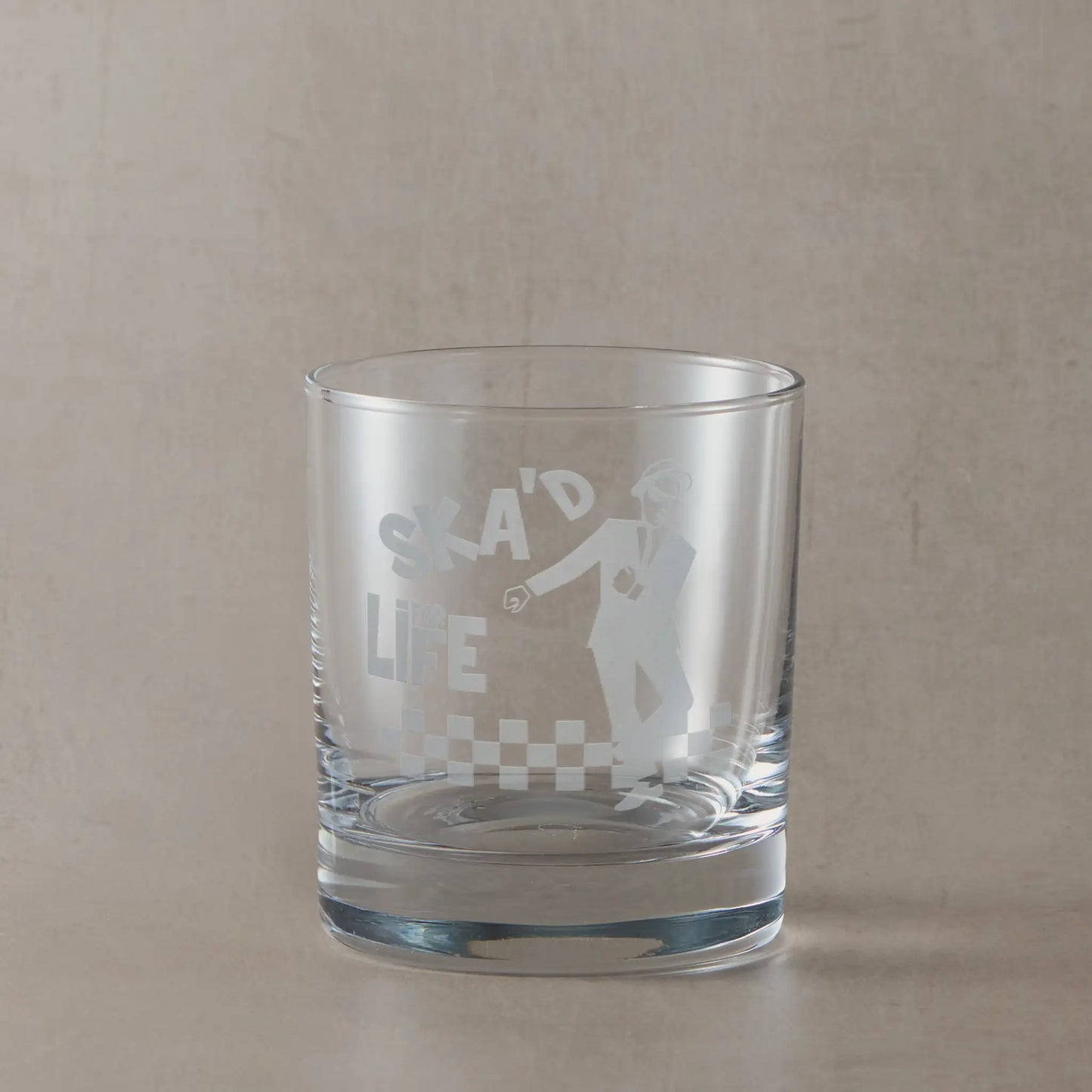 whisky glass engraved with a 2 tone ska man and checkerboard SKA'd for life design