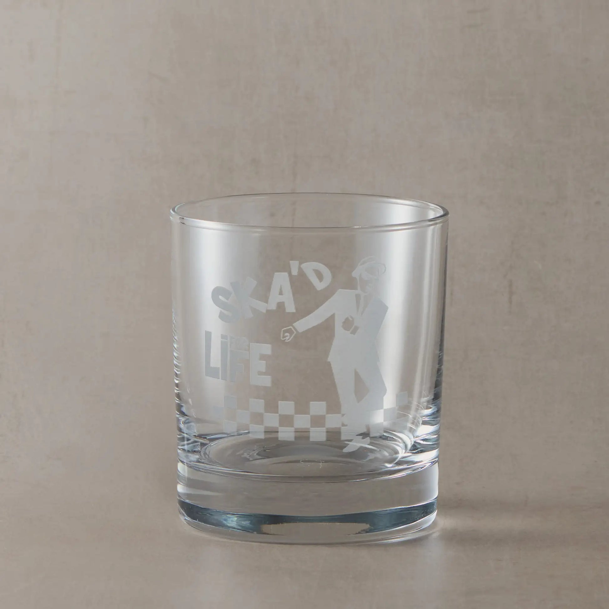 whisky glass engraved with a 2 tone ska man and checkerboard SKA'd for life design