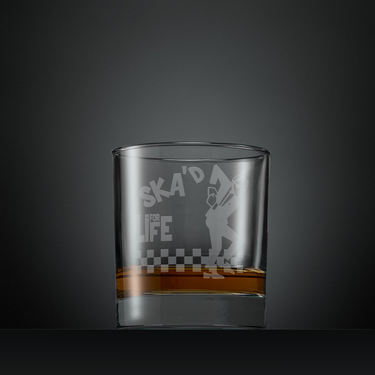 Engraved whisky glass with Ska'd for Life Man and checkerboard design