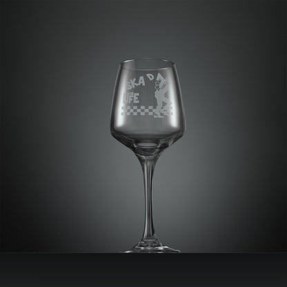 Engraved wine glass with SKA man dancing on a checkerboard floor