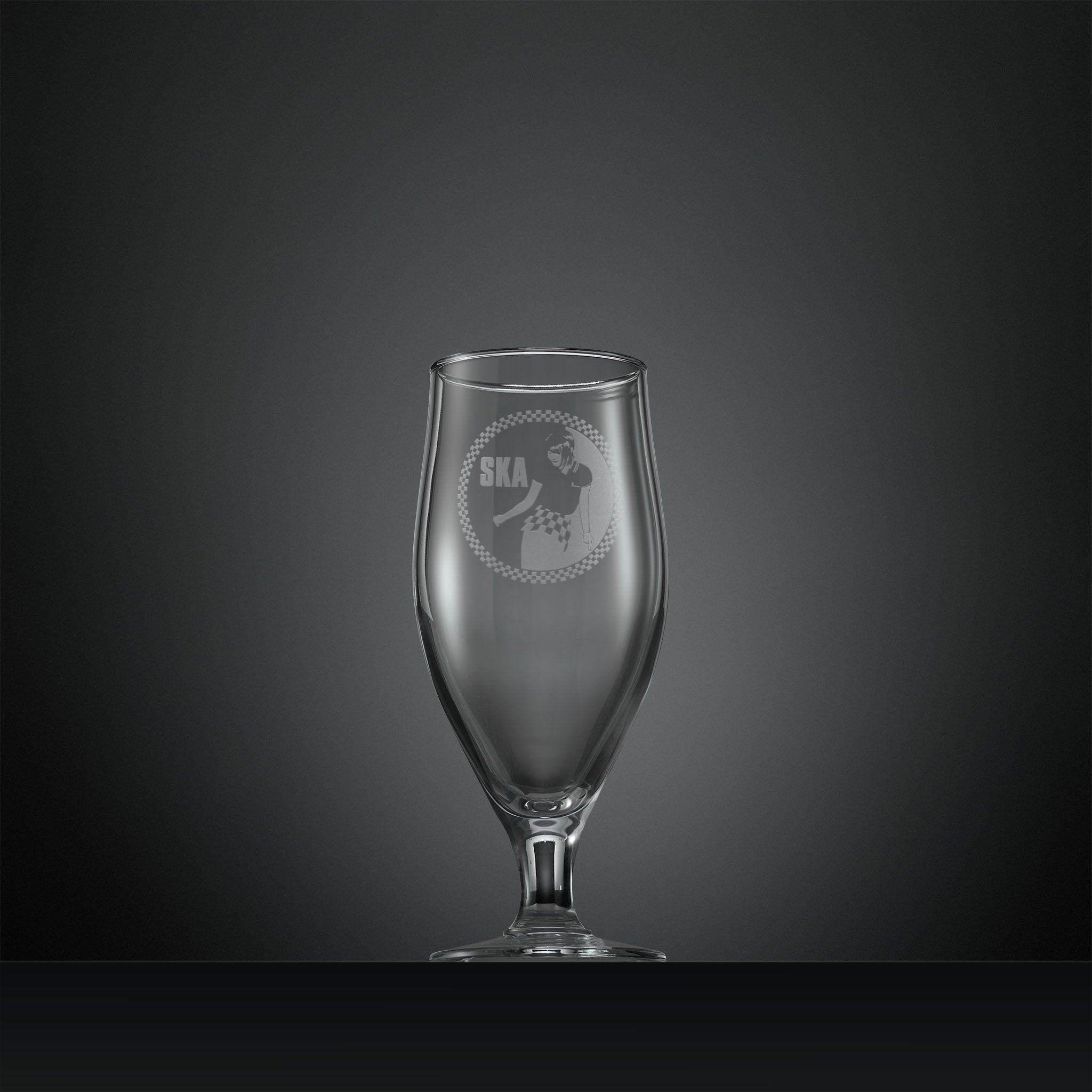 Engraved stemmed beer glass with Ska rude girl facing left and checkerboard design