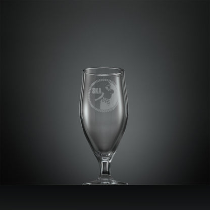 Engraved stemmed beer glass with Ska rude girl facing left and checkerboard design