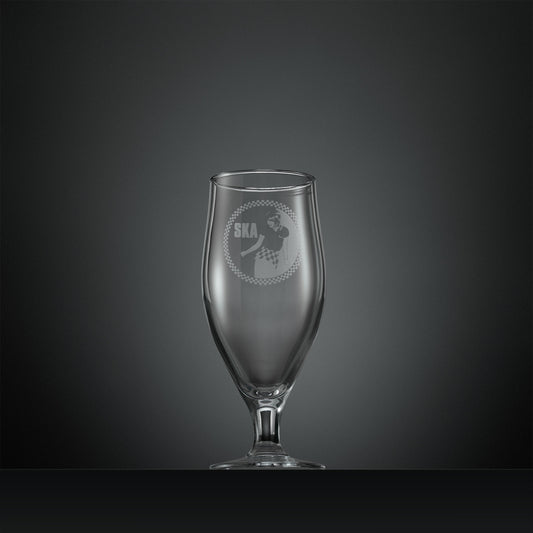 Engraved stemmed beer glass with Ska rude girl facing left and checkerboard design