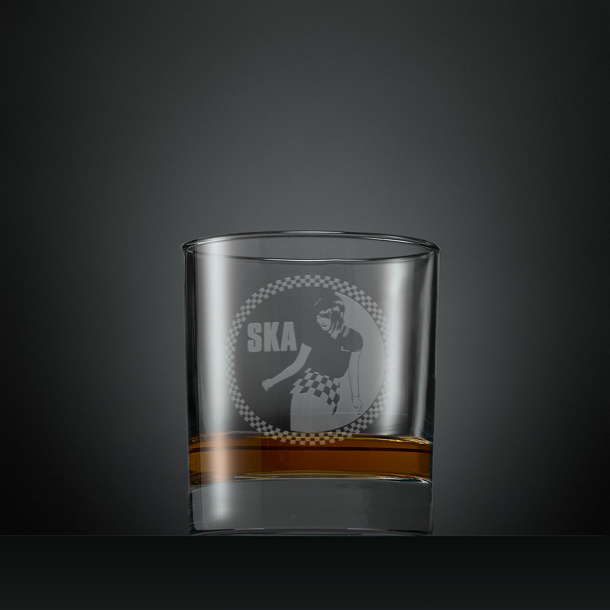 Engraved whisky glass with Ska rude girl facing left and checkerboard design
