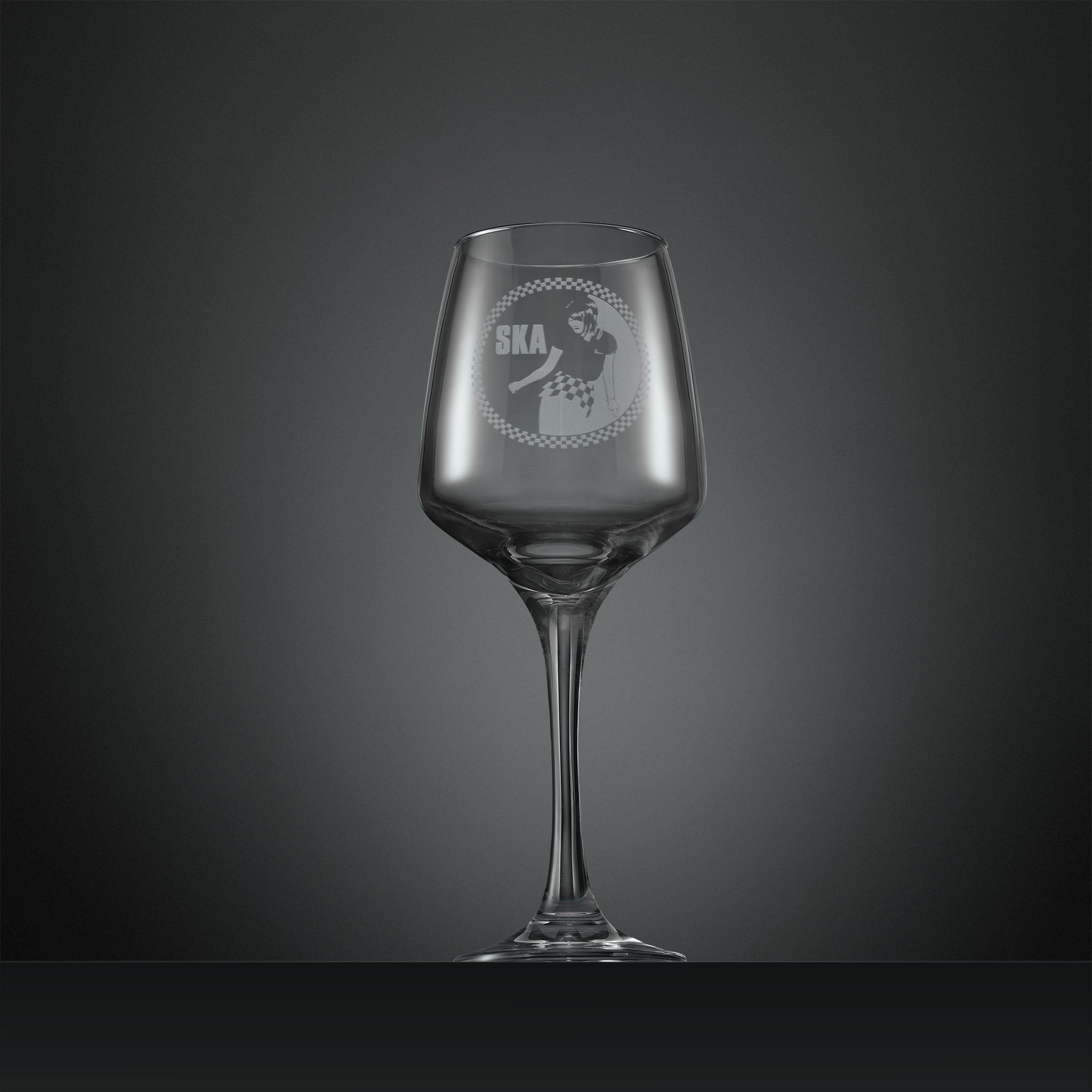 Engraved wine glass with Ska rude girl facing left and checkerboard design