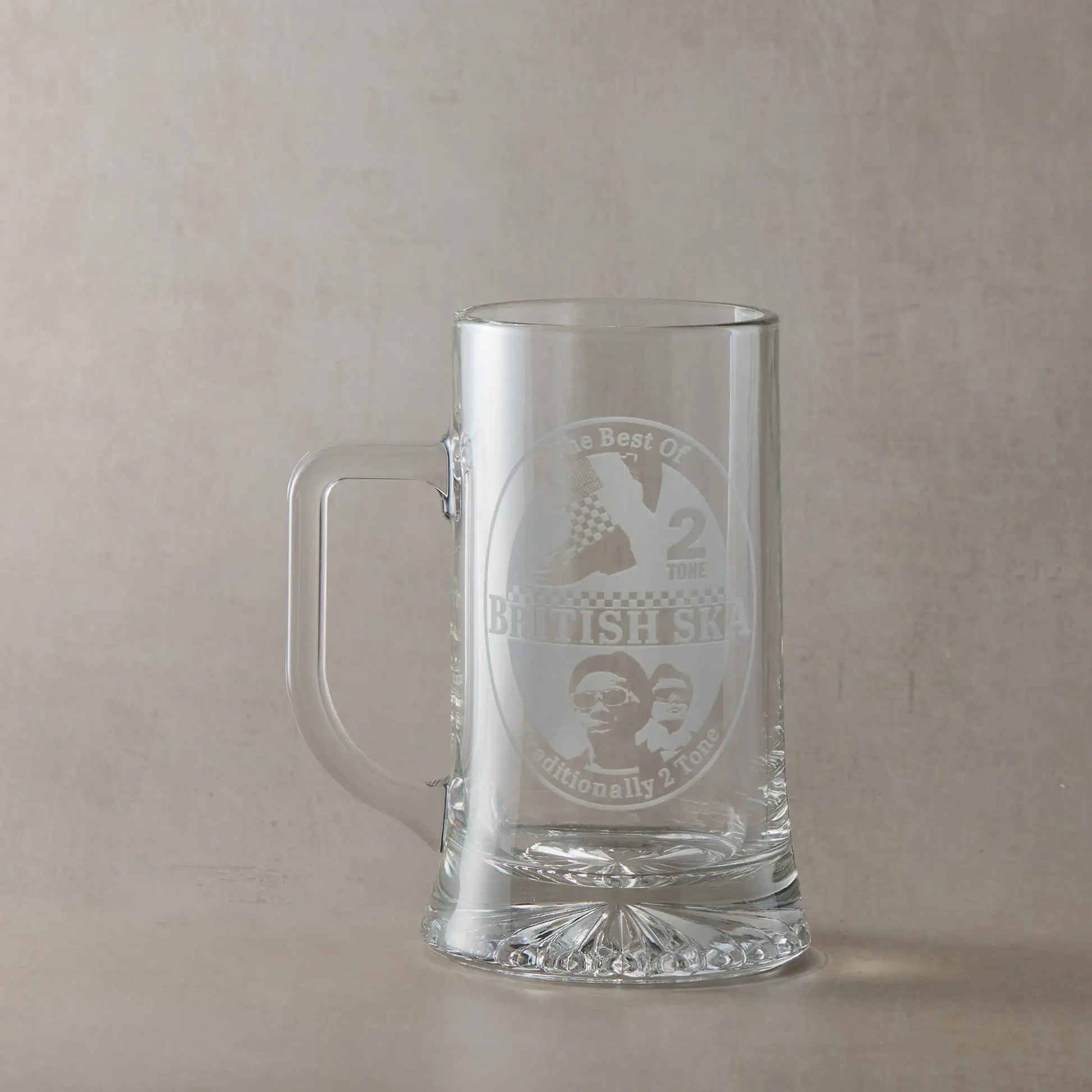 Glass tankard engraved with British SKA, 2 tone and checkerboard sock designs, shown n a neutral background