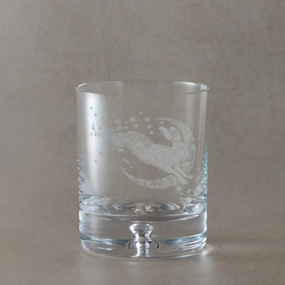 Winter snowflakes whisky glass with engraved leaping hare and crescent moon
