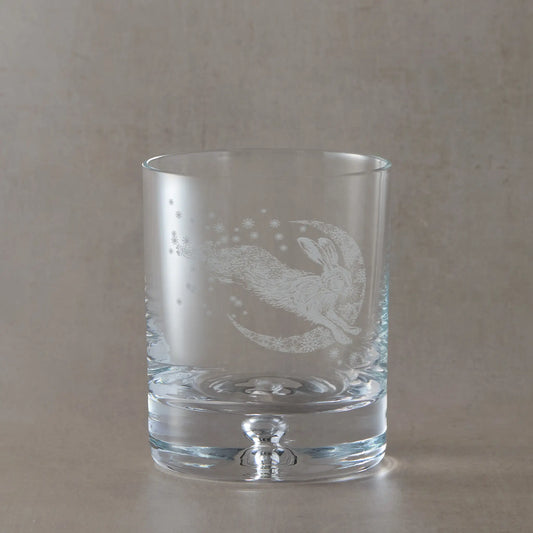 Winter snowflakes whisky glass with engraved leaping hare and crescent moon
