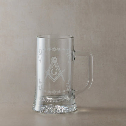 Masonic  tankard with Square & Compass and lodge details, displayed on beige background, handle to the right of design