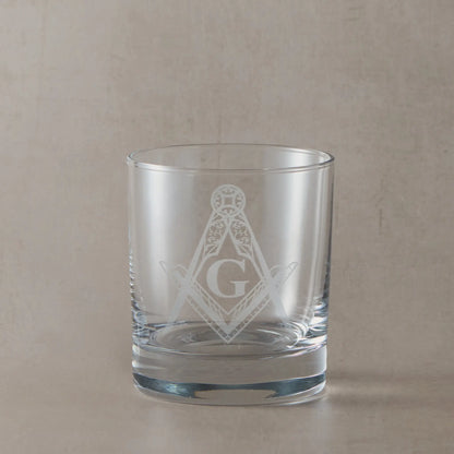 Whisky glass engraved with a detailed masonic square and compass with the letter G in the centre