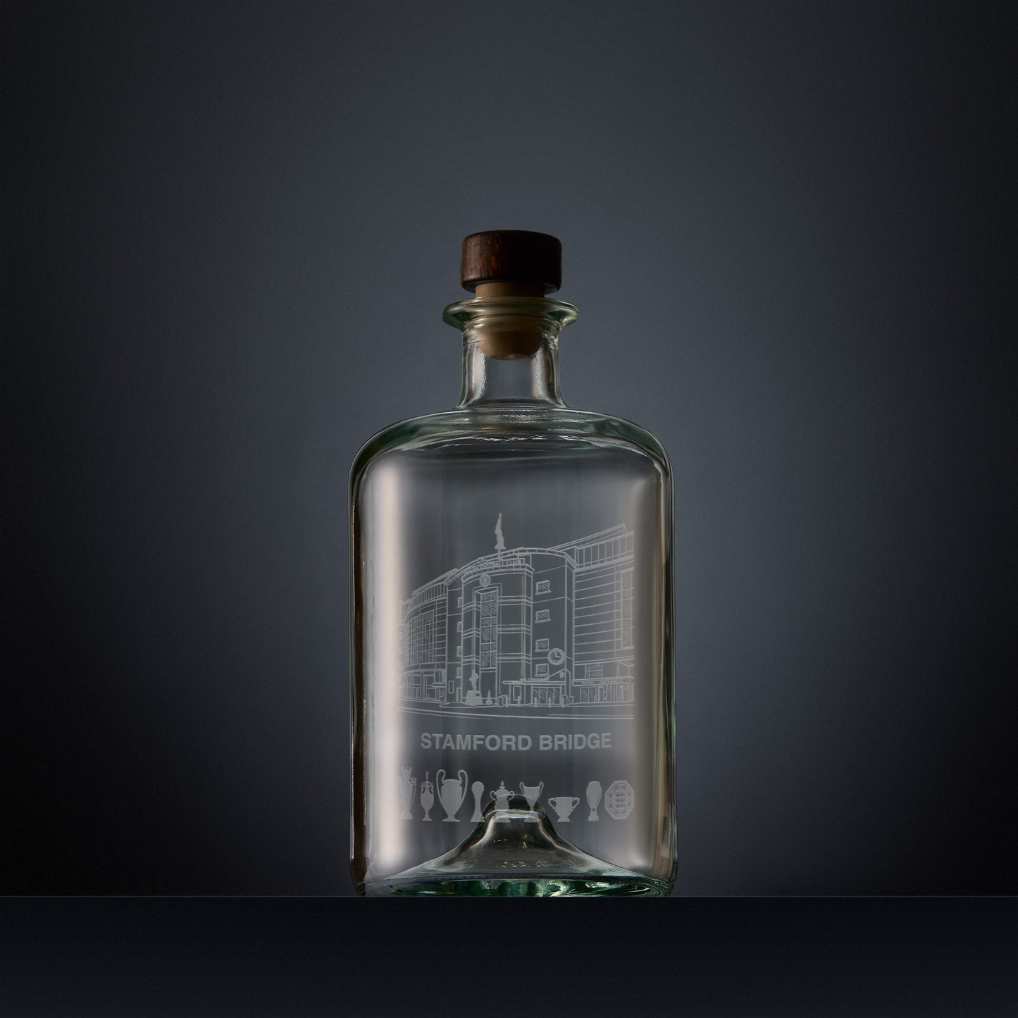 Engraved apothecary-style decanter with Stamford Bridge stadium illustration