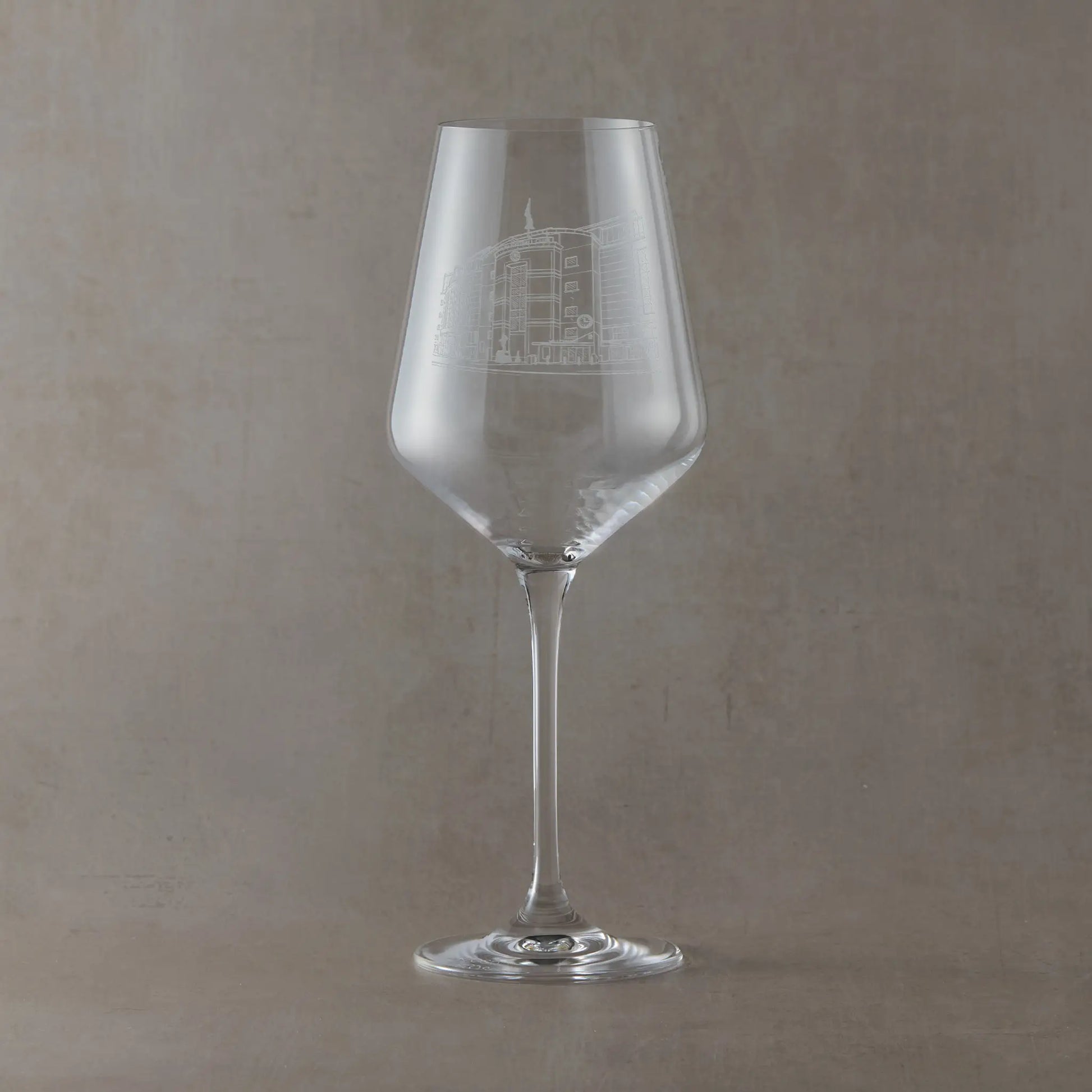 Wine glass engraved with line-art interpretation of Stamford Bridge Football Stadium