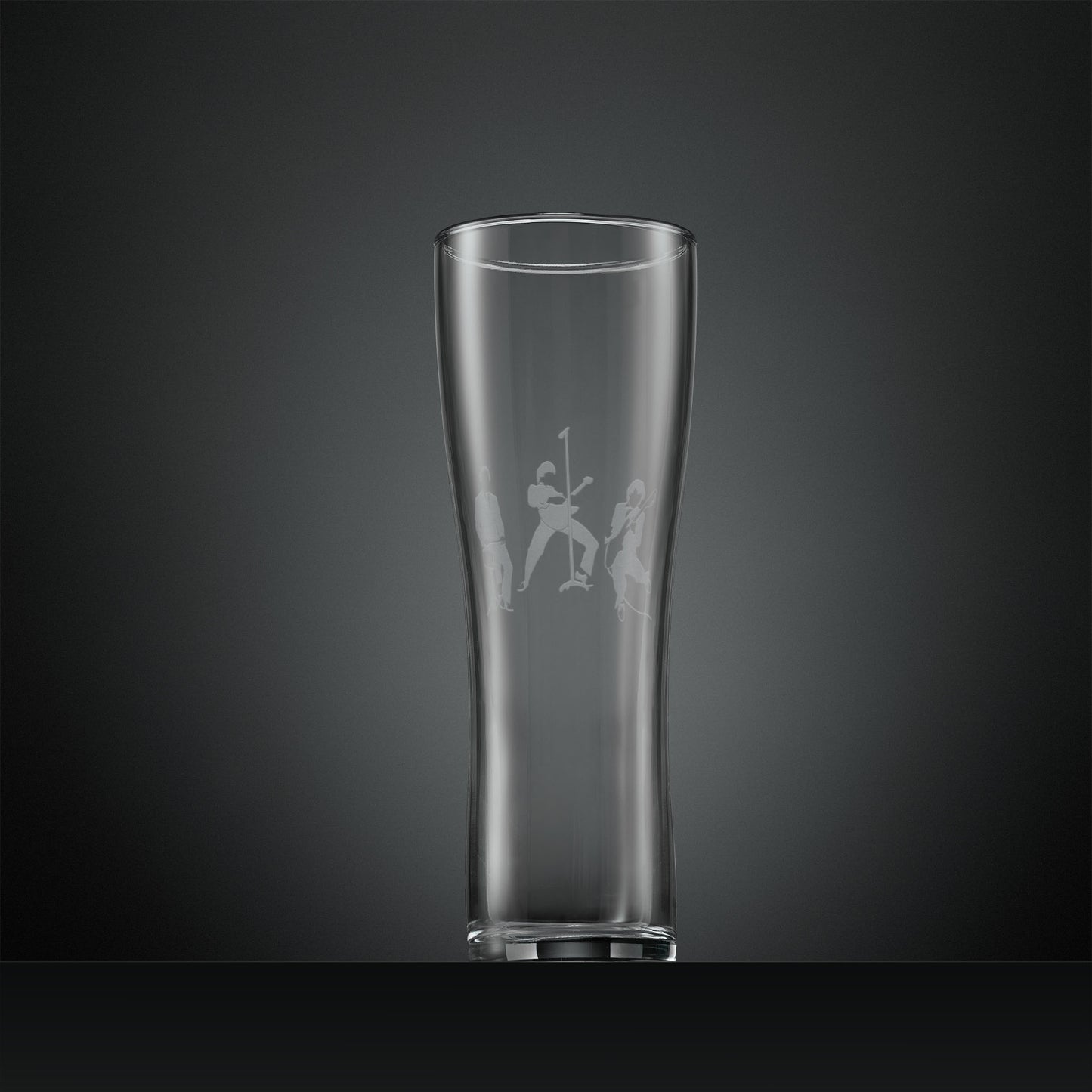 Engraved pint glass with silhouette of The Jam band members