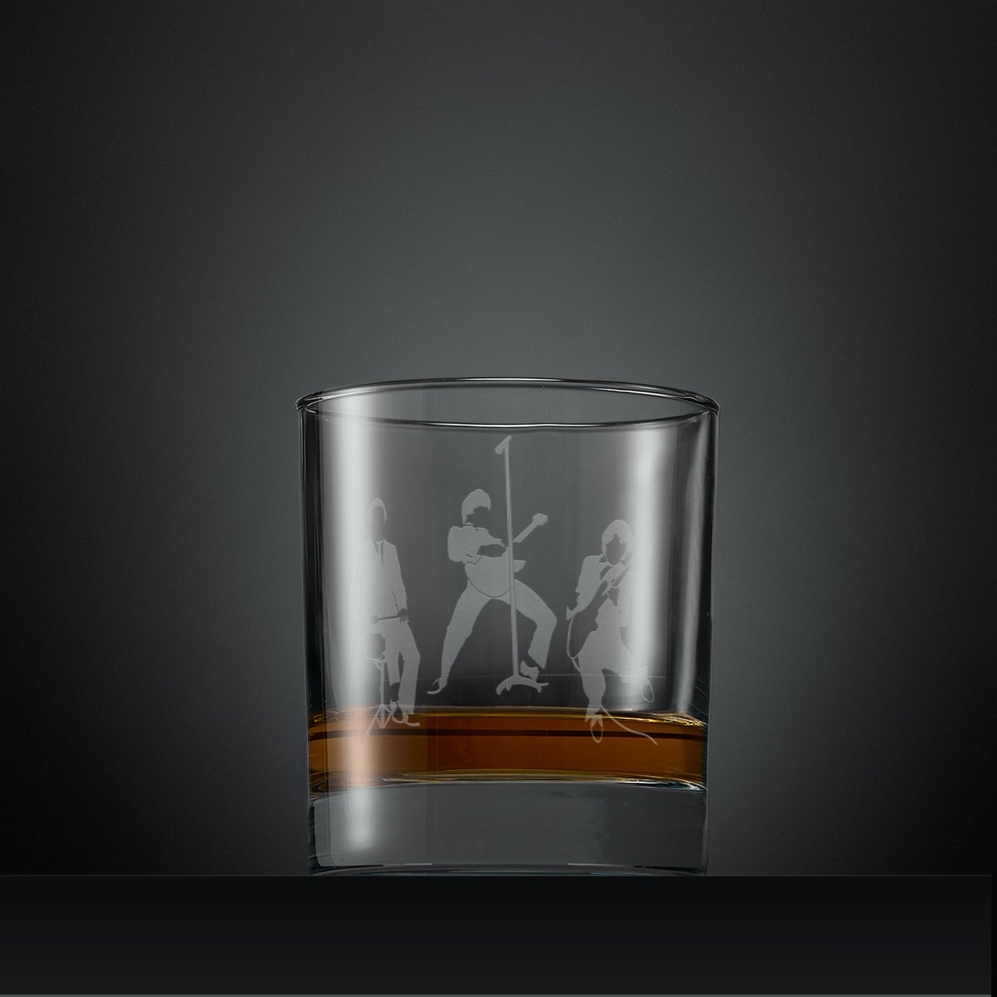 Engraved whisky glass with silhouette of The Jam band members