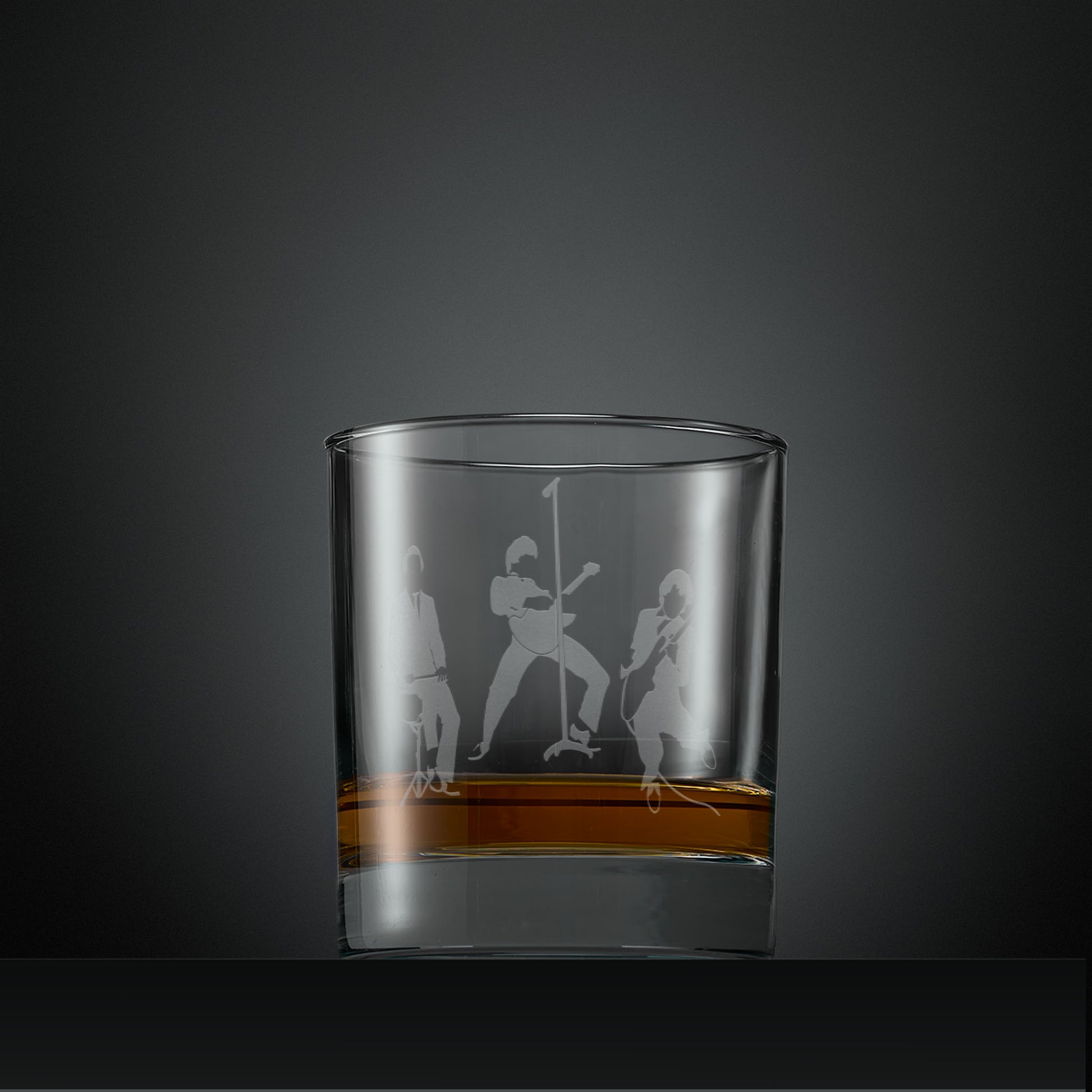 Engraved whisky glass with silhouette of The Jam band members
