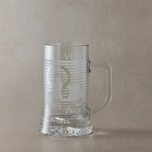 Vespa 50 Special scooter engraved tankard with handle right, photographed on neutral beige background.