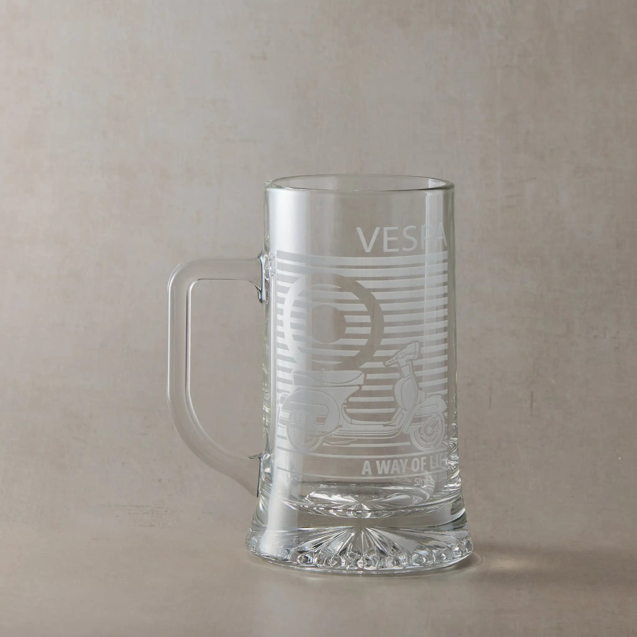 Vespa 200 scooter engraved tankard with handle left photographed on neutral beige background.