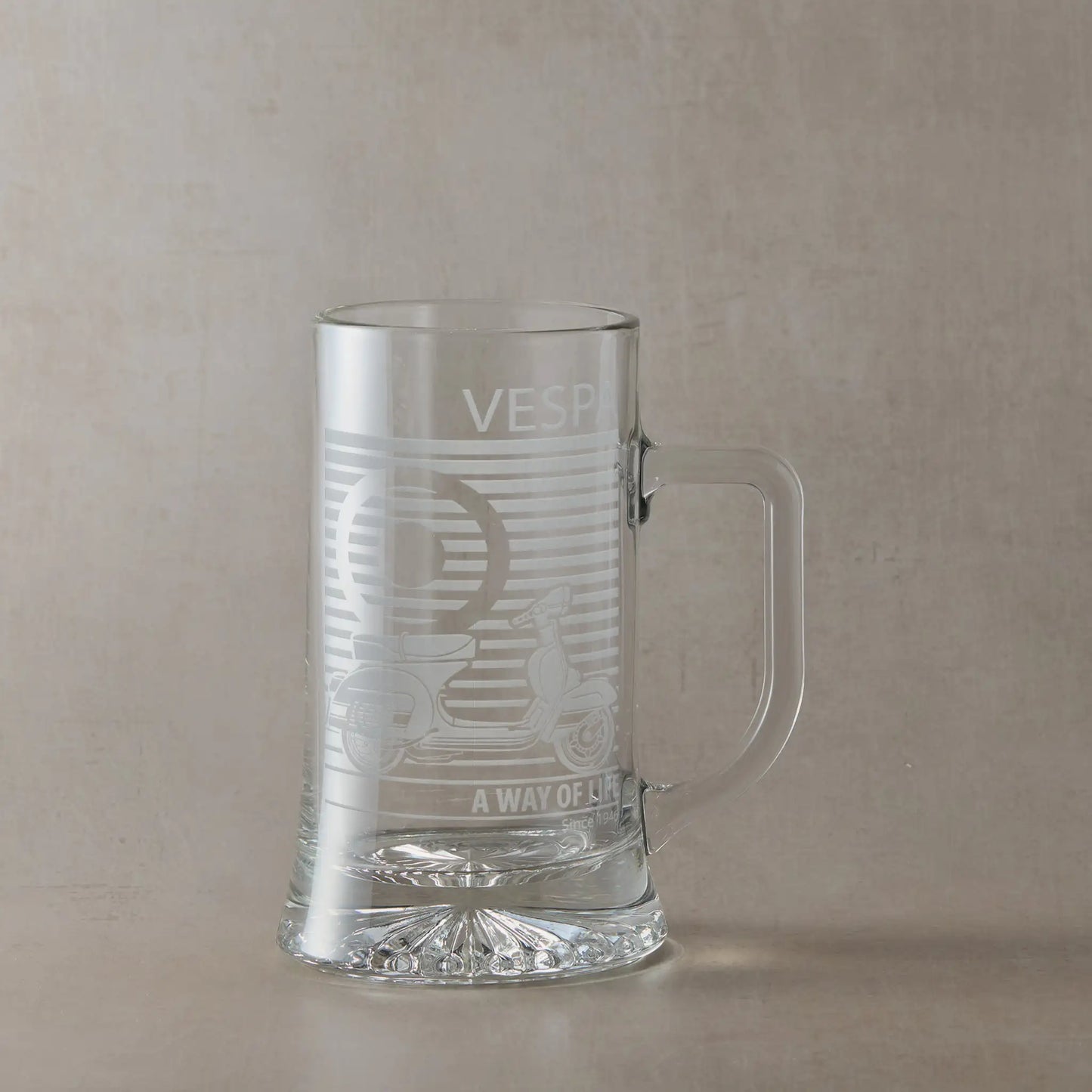 Vespa 200 scooter engraved tankard with handle right, photographed on neutral beige background.