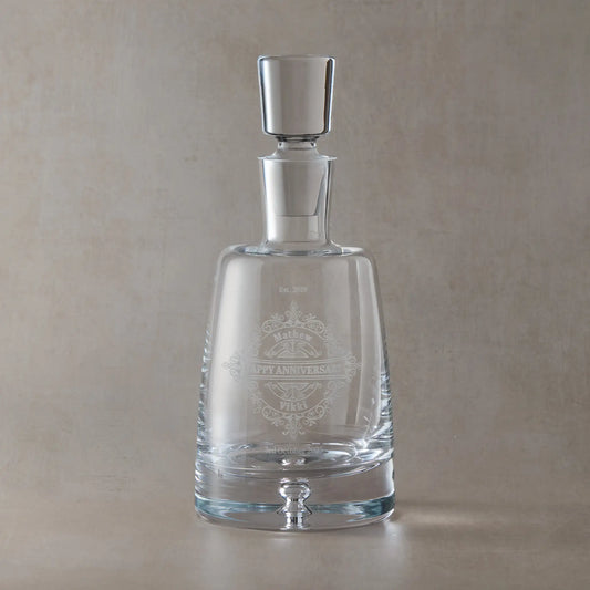 Handmade decanter engraved with Happy Aniversary, Names and date surrounded by a venetian lacework design.