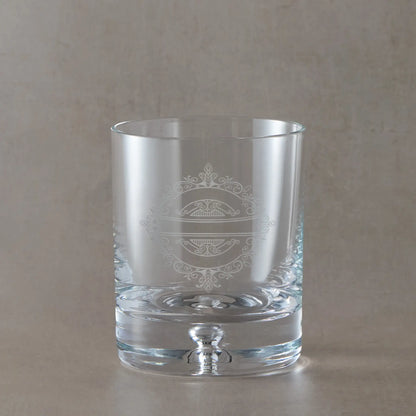 Wedding party whisky glass engraved with a venetian lace design, shown on a neutral background