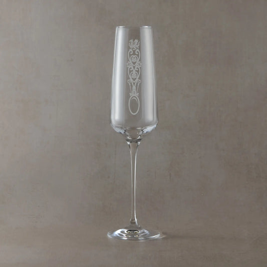 Engraved glass champagne flute with lovespoon and Welsh Dragon design