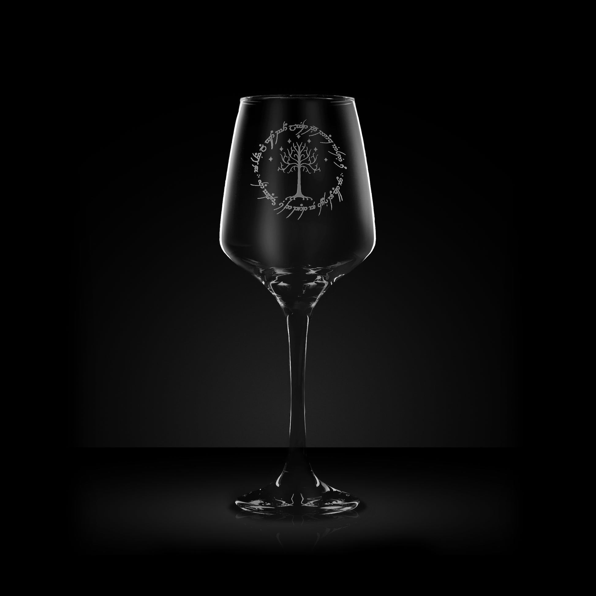 engraved wine glass with gondor's white tree, stars and elvish text