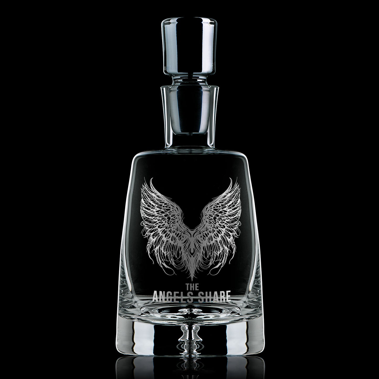 Hand-engraved glass decanter featuring angel wings and ‘The Angel’s Share’ text, ideal whisky lover’s gift