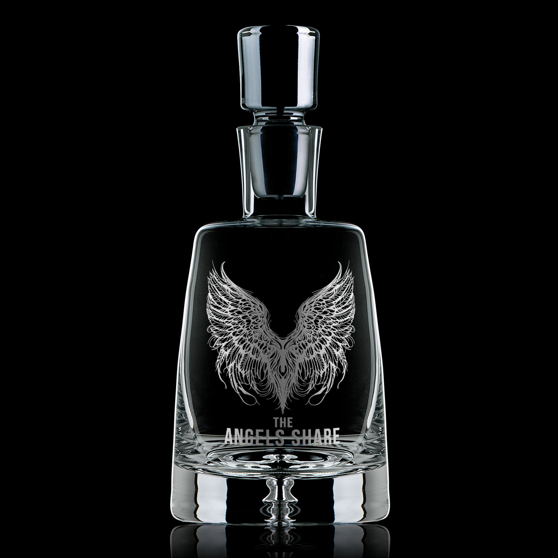 Hand-engraved glass decanter featuring angel wings and ‘The Angel’s Share’ text, ideal whisky lover’s gift