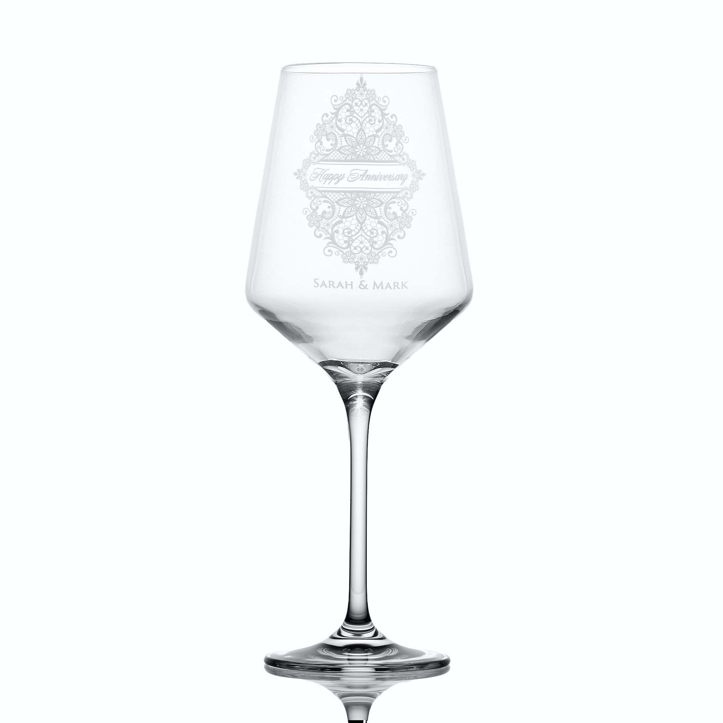 Wine glass engraved with Happy Anniversary and an intricate Guipure lace design, part of our artisan collection