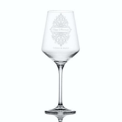 Wine glass engraved with Happy Anniversary and an intricate Guipure lace design, part of our artisan collection