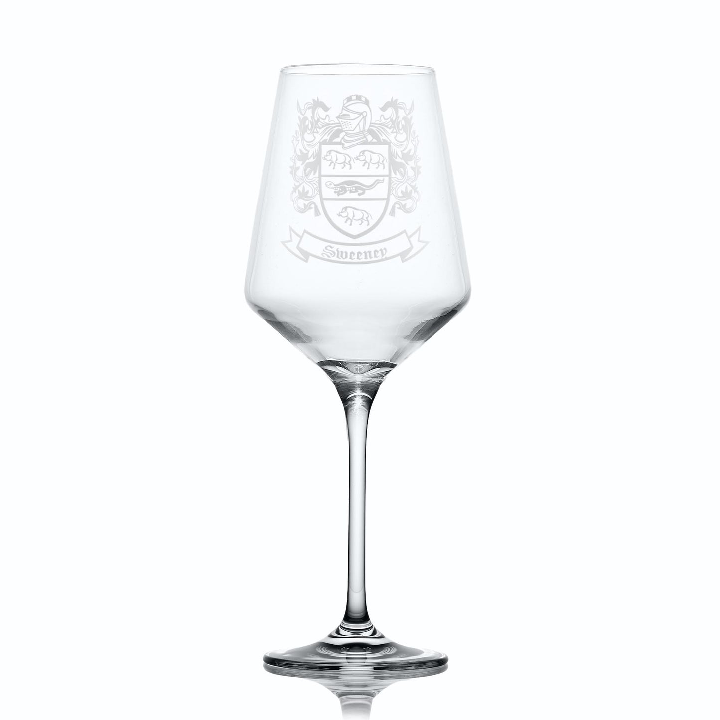 Clear wine glass with an engraved crest on a white background