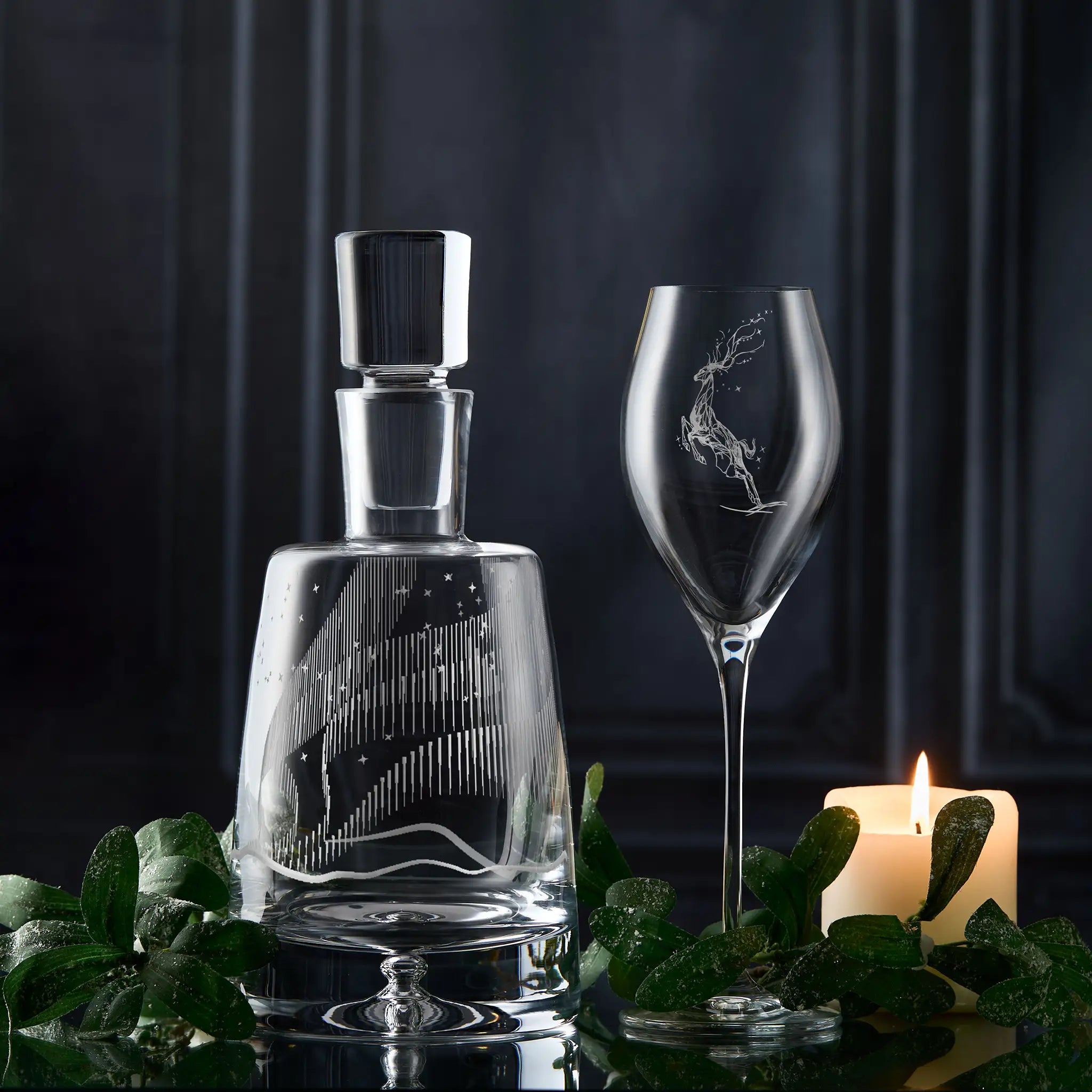 Aurora Borealis engraved decanter and prosecco glass featuring a leaping stag.