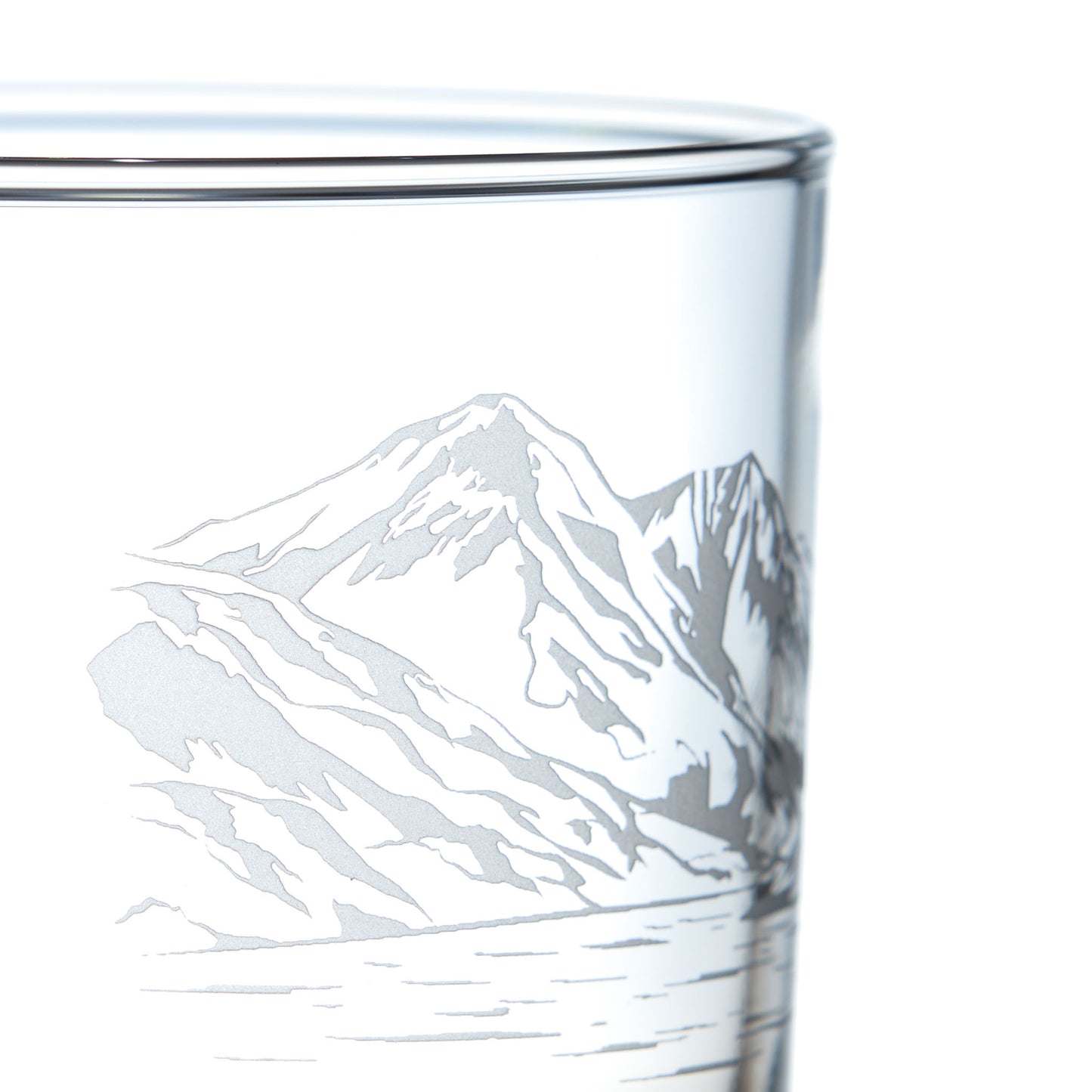 Close-up detail of whisky glass engraved with Ben Lomond