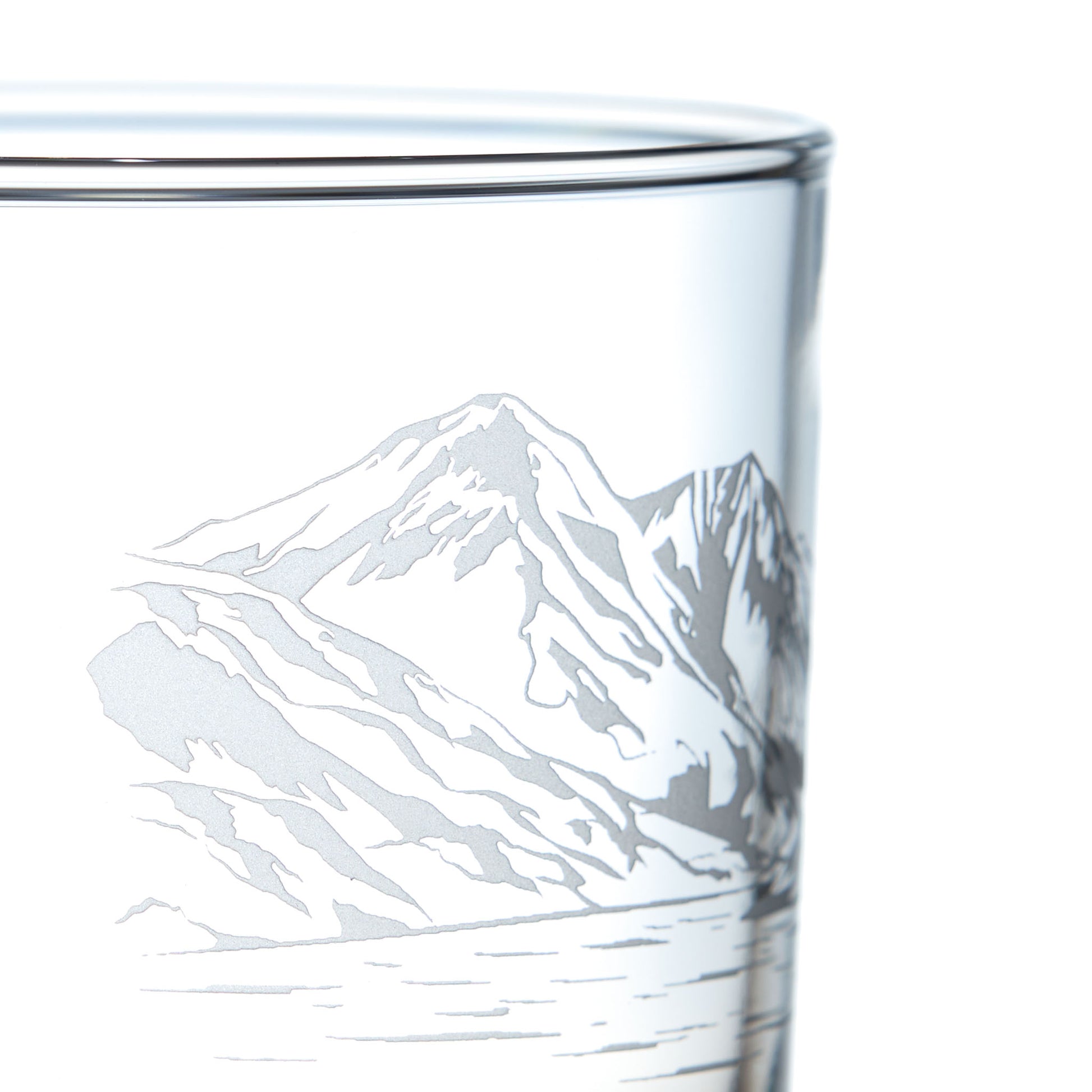 Close-up detail of whisky glass engraved with Ben Lomond