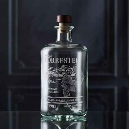 Apothecary-style decanter engraved with Ben Nevis, photographed in situ against a dark background