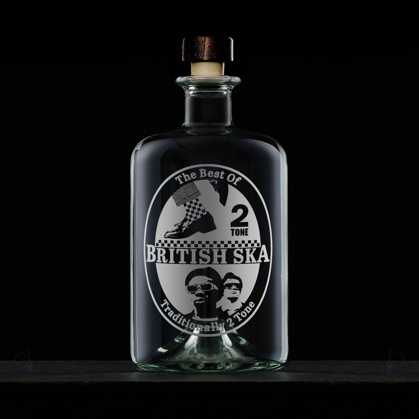 Engraved glass decanter featuring ska and Two Tone inspired oval design in the style of a vintage beermat