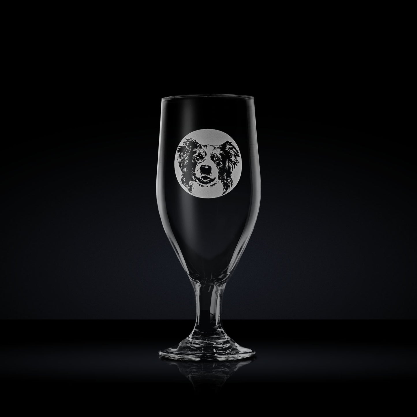 chalice beer glass engraved with a portrait of a border collie dog