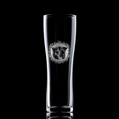 Pint glass with engraved Border Collie portrait in circular frame with leafy garland