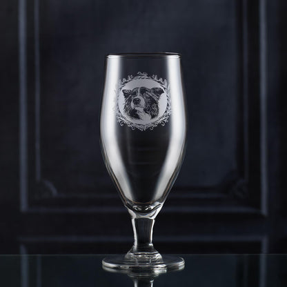 Engraved Border Collie stemmed beer glass with a detailed dog portrait surrounded by a leafy garland, hand-engraved in Scotland by Just The Ticket.