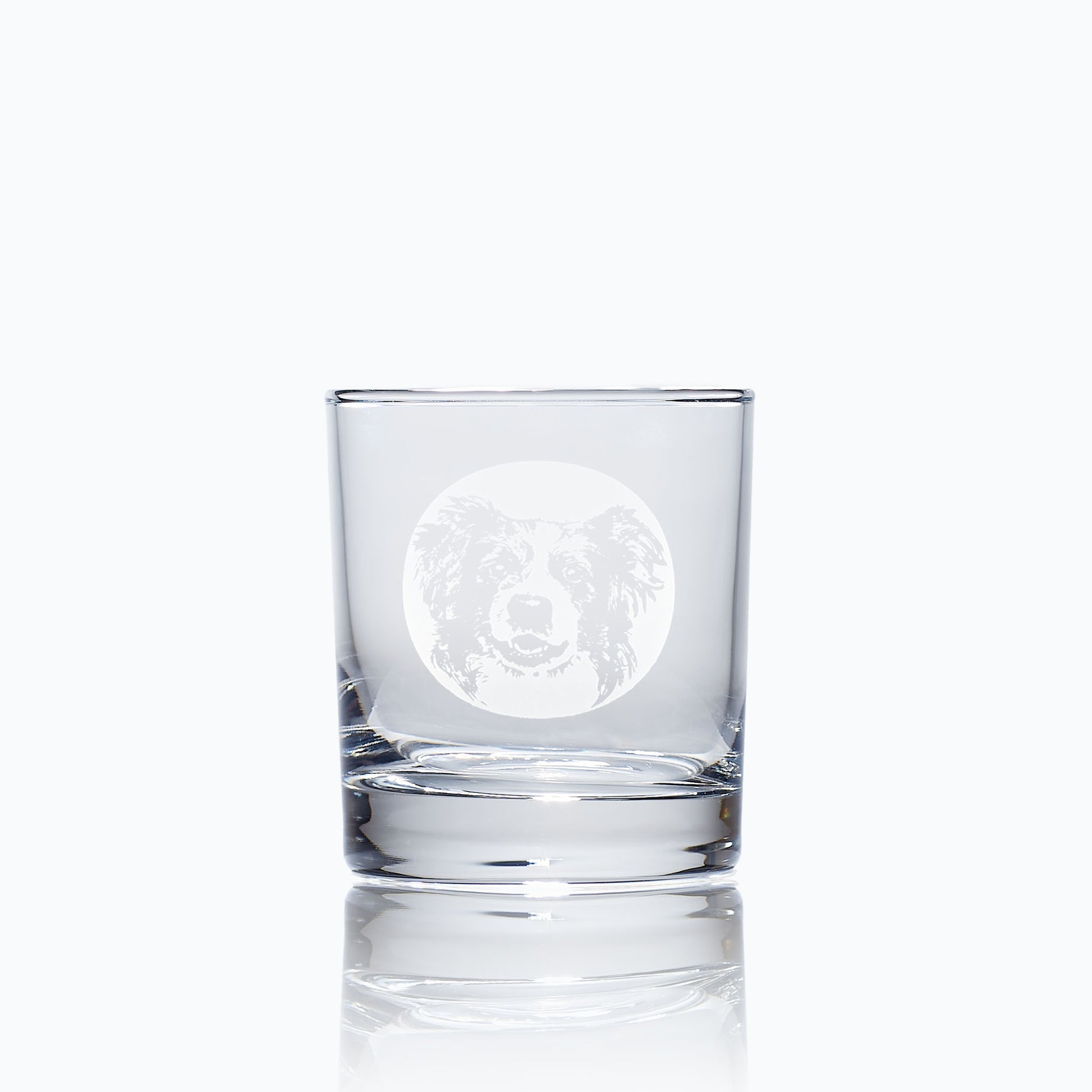 engraved whisky glass etched with a portrait of a border collie dog