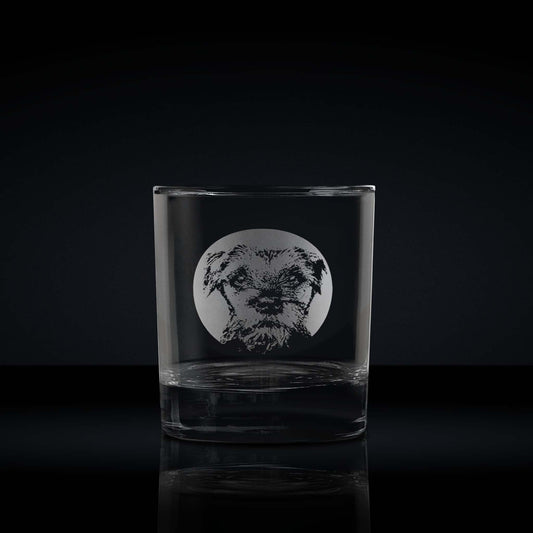 engraved whisky glass etched with a portrait of a border terrier dog