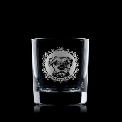 Whisky glass with engraved border terrier portrait in circular frame with leafy garland
