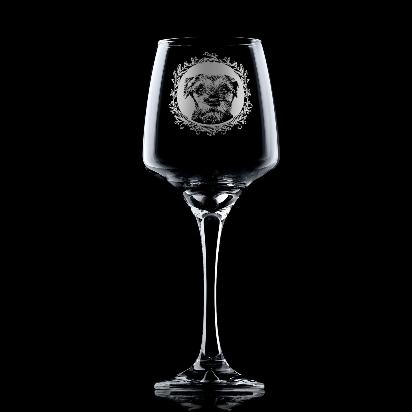 Wine glass with engraved border terrier portrait in circular frame with leafy garland