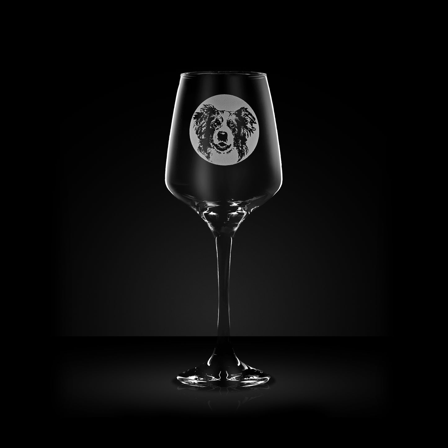 etched wine glass engraved with a portrait of a border collie dog