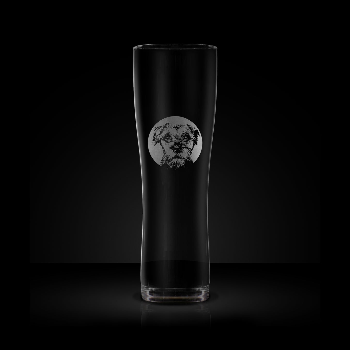 engraved craft beer glass etched with a portrait of a border terrier dog