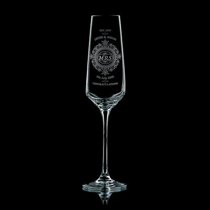 Bride’s champagne glass with elegant wedding engraving