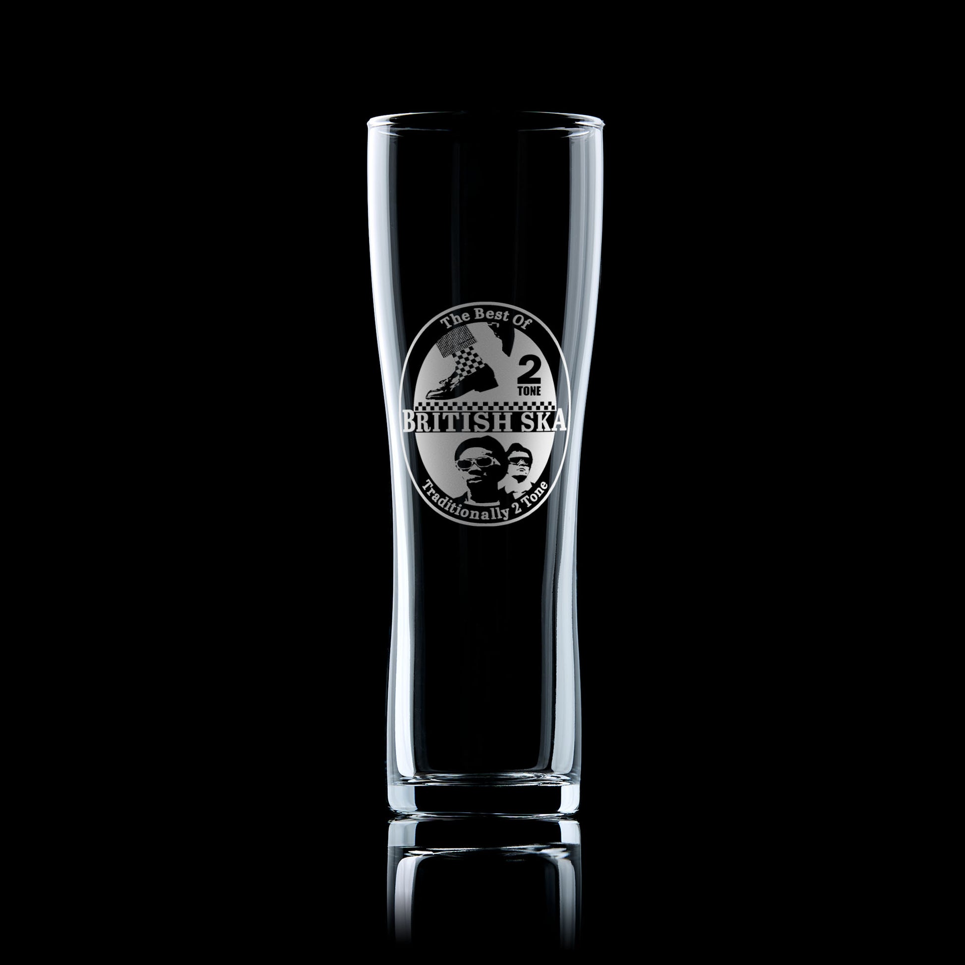 Engraved pint glass featuring a British ska beermat design with 2 Tone music imagery, styled for fans of ska, reggae, and Mod culture.